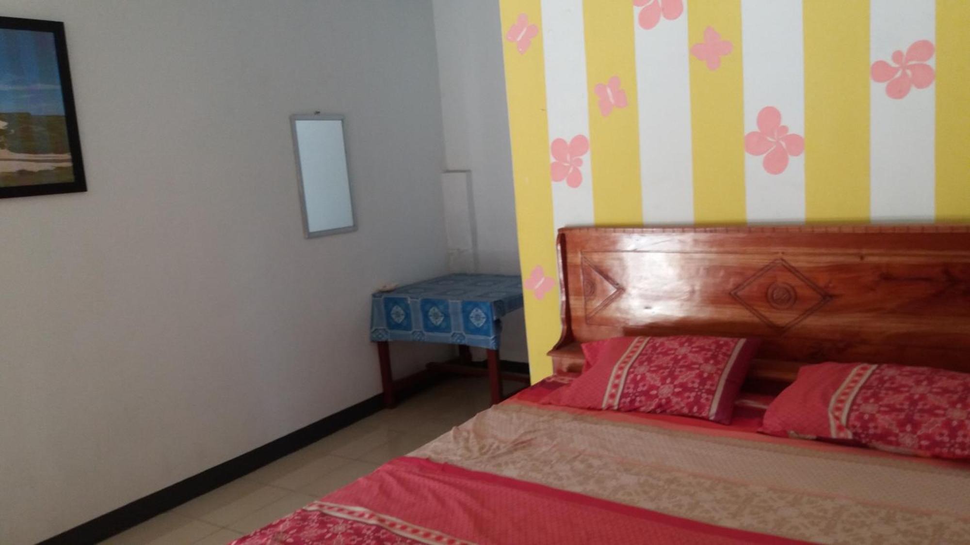 Ekas Beach Guesthouse Mitra Reddoorz Quarto foto
